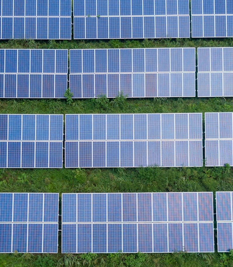 Aerial shot of a solar panel array generating renewable energy in Trenton, Georgia.